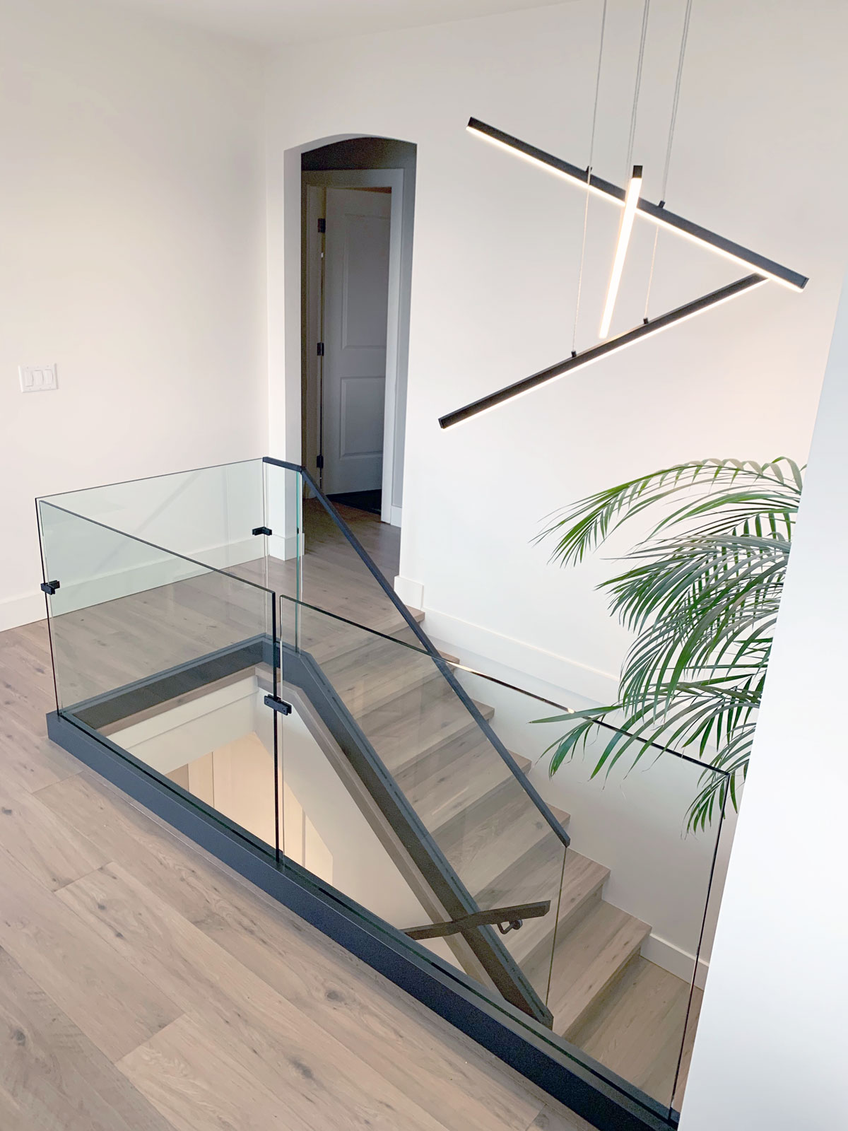 Glass railing on landing and stairs